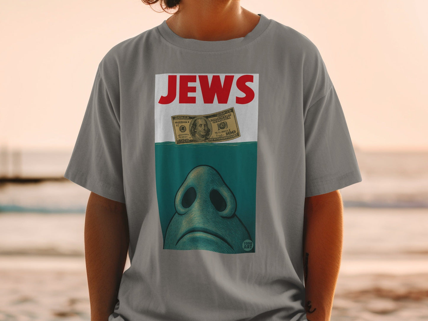 T-shirt with a shark fin and a $100 bill, text "JEWS".