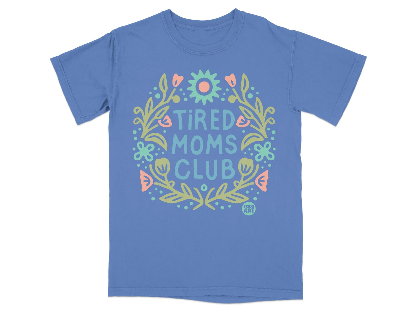 Blue t-shirt with "Tired Moms Club" text and floral wreath.