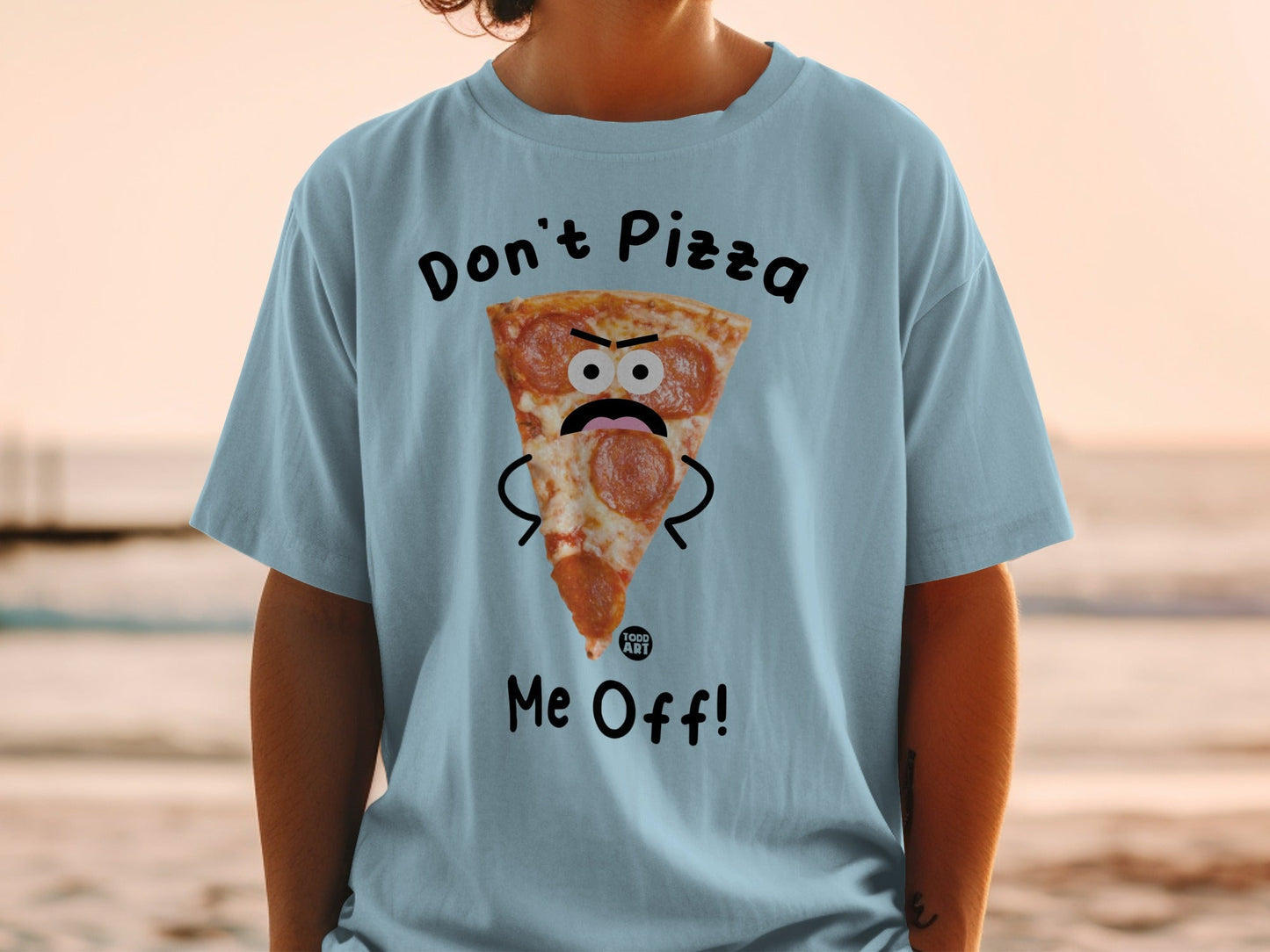 T-shirt with a cartoon pizza slice saying "Don't Pizza Me Off!"