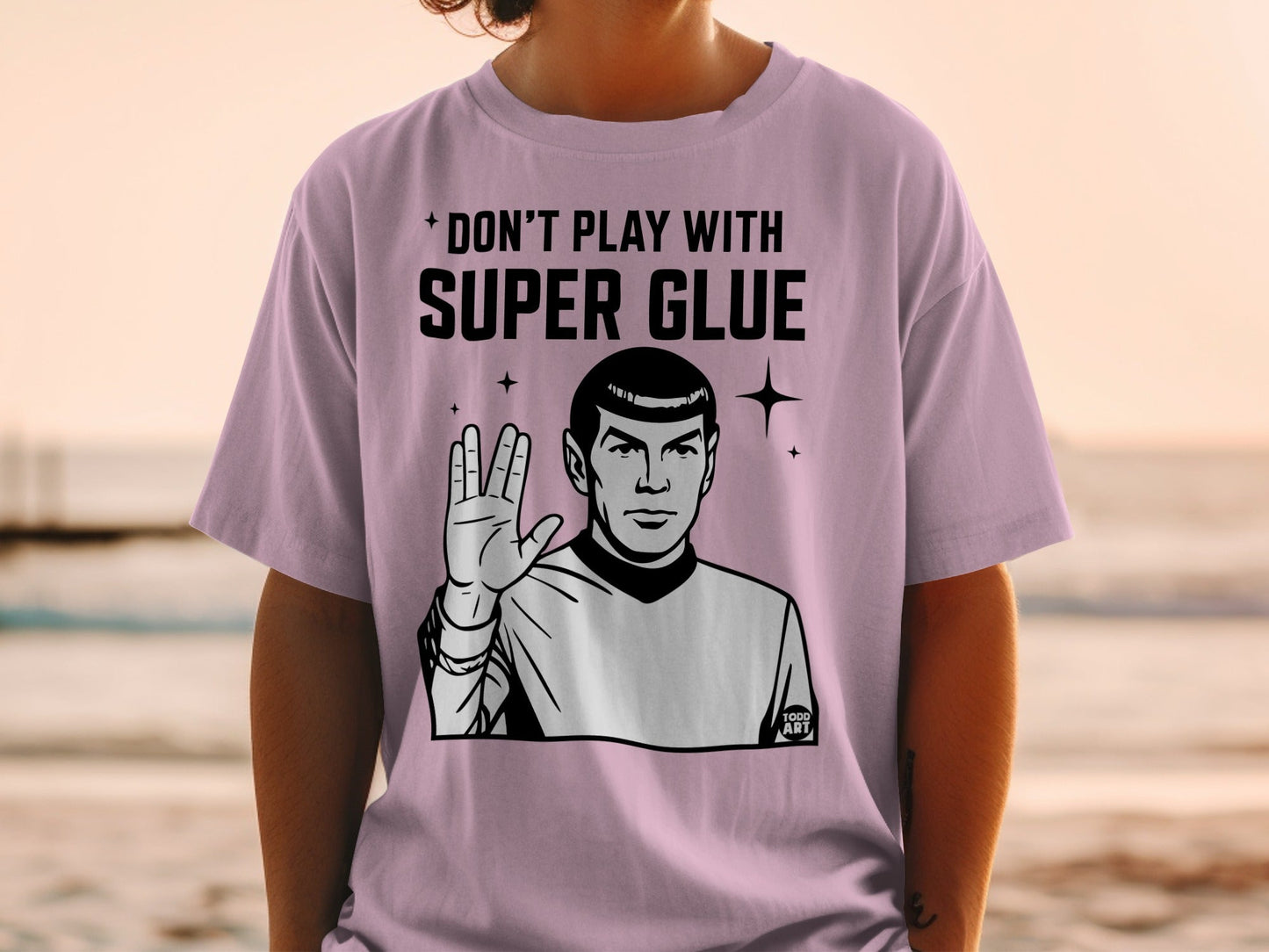 Spock from Star Trek in a t-shirt with "DON'T PLAY WITH SUPER GLUE".