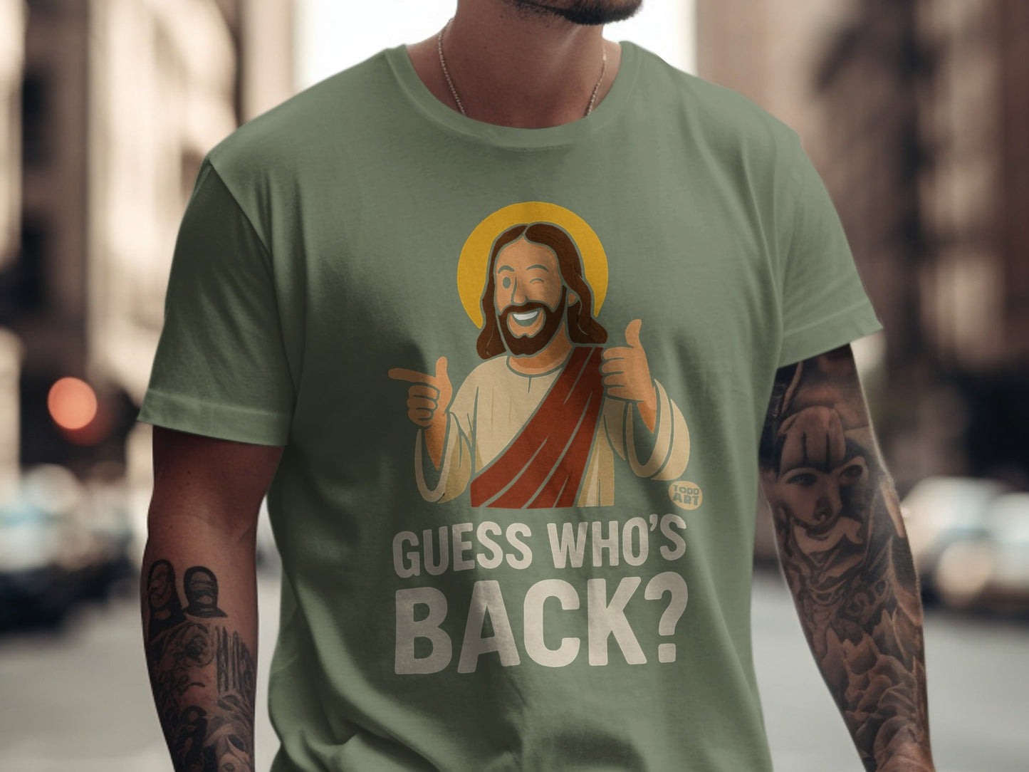 T-shirt with Jesus graphic, halo, thumbs up, and text "GUESS WHO'S BACK?".