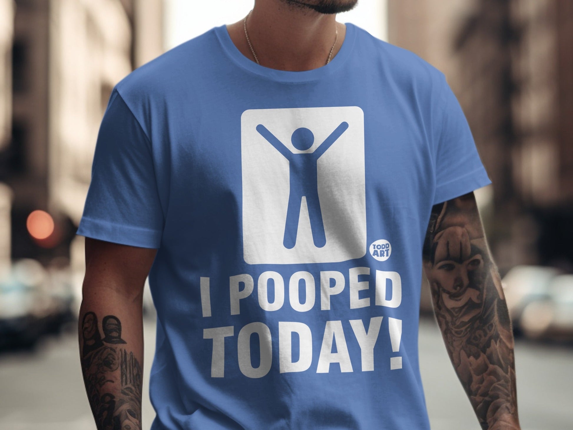 Blue t-shirt with white icon of person with arms up and text "I POOPED TODAY!".