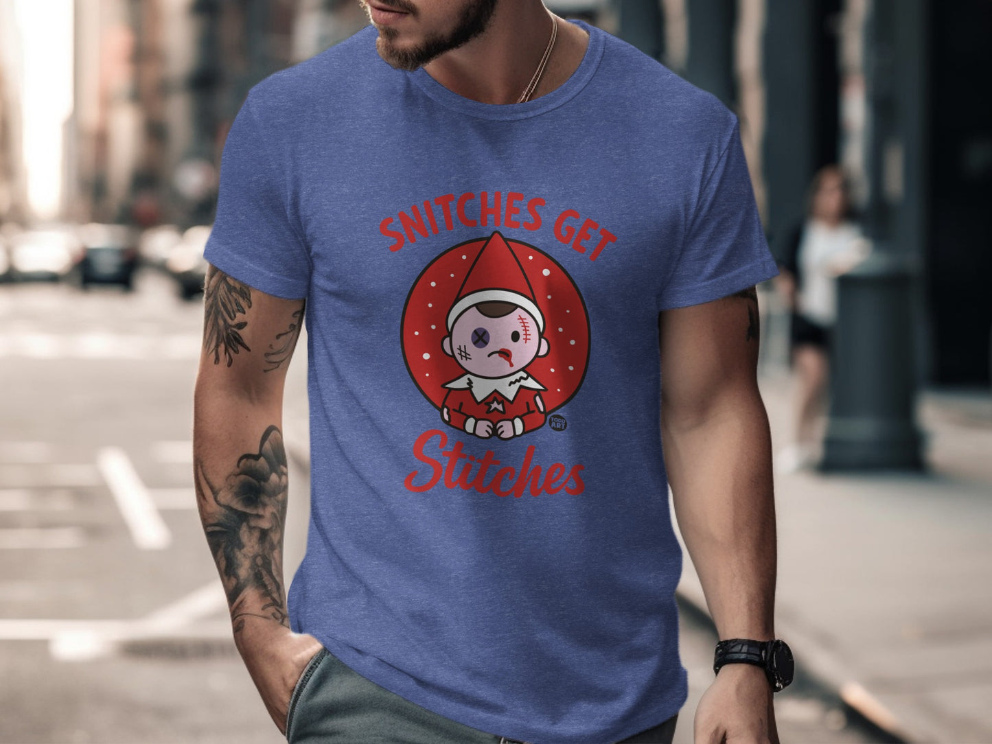 Snitches Get Stitches Elf Graphic Tee product