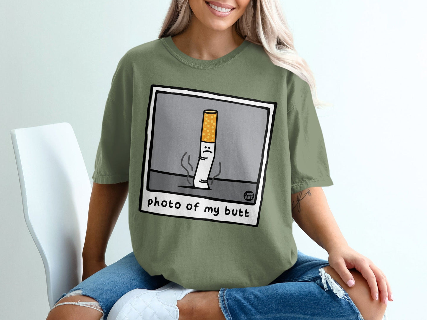 Illustration of a sad cigarette butt with "photo of my butt" text.