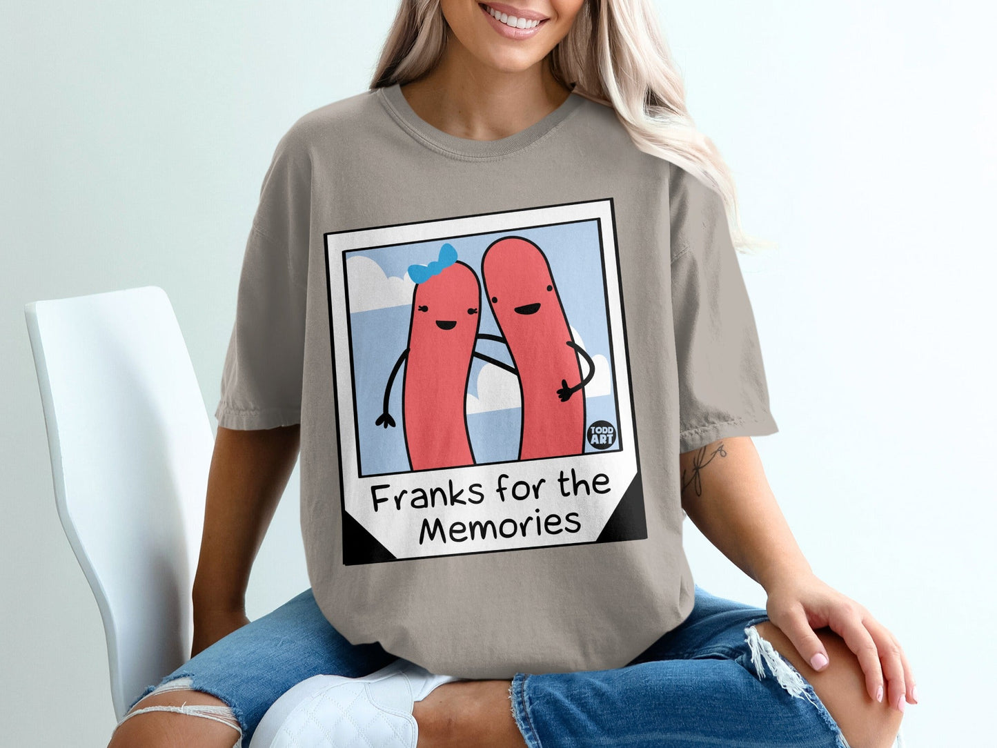 Two cartoon hot dogs with arms around each other, "Franks for the Memories" text.