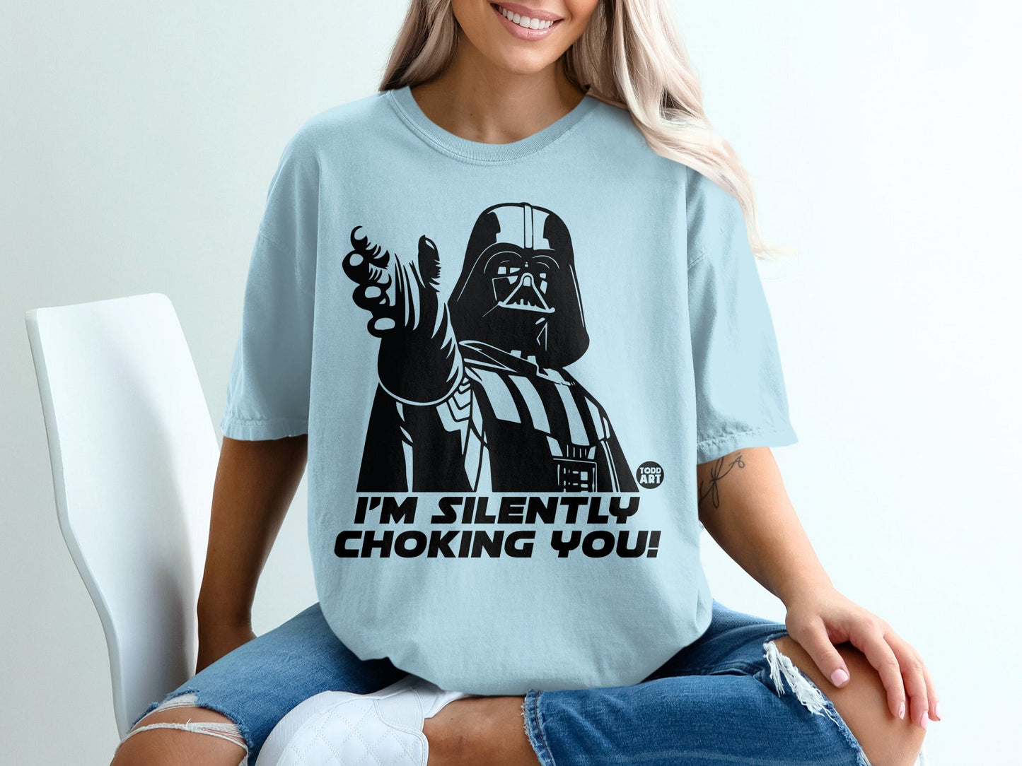 Light blue t-shirt featuring Darth Vader pointing with "I'M SILENTLY CHOKING YOU!" text.