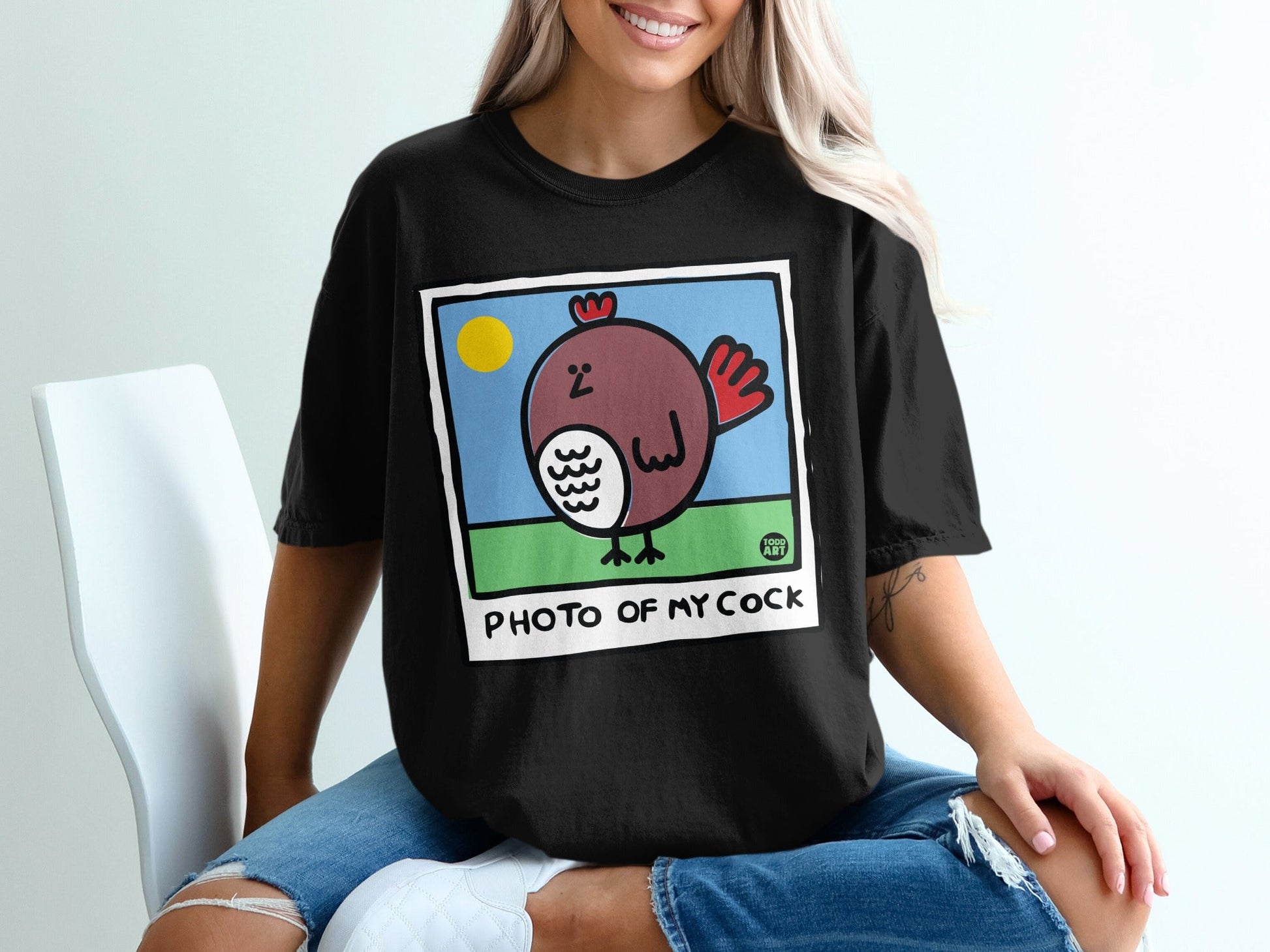 Black t-shirt with a cartoon rooster and "PHOTO OF MY COCK" text.
