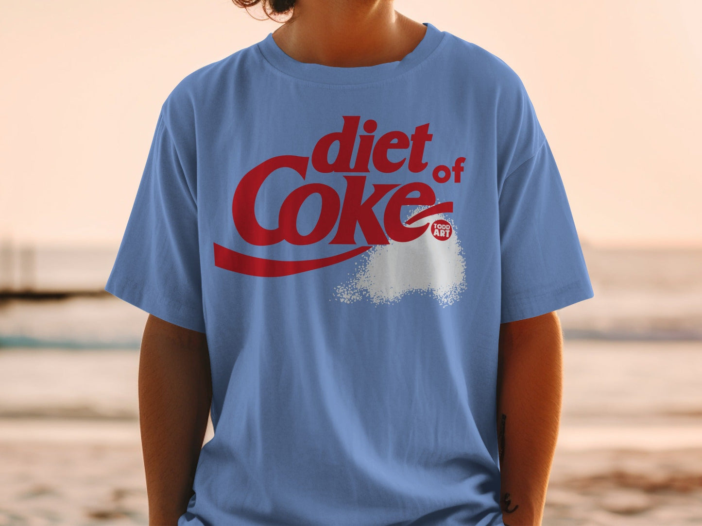 Blue t-shirt with red Diet Coke logo and white sugar graphic.