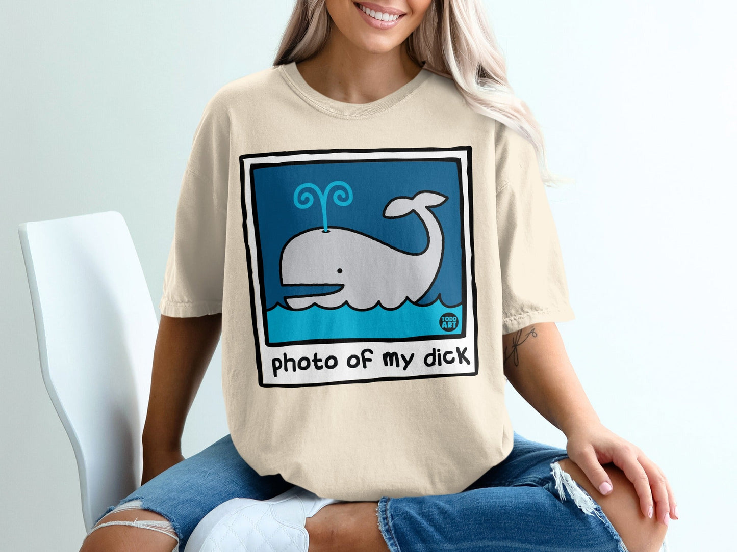 Cartoon whale spouting water with text "photo of my dick".