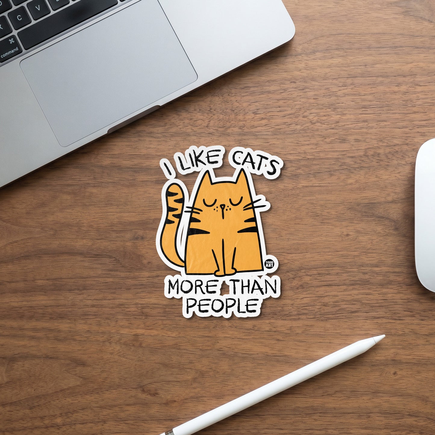 Sticker of a cartoon cat with text "I LIKE CATS MORE THAN PEOPLE."
