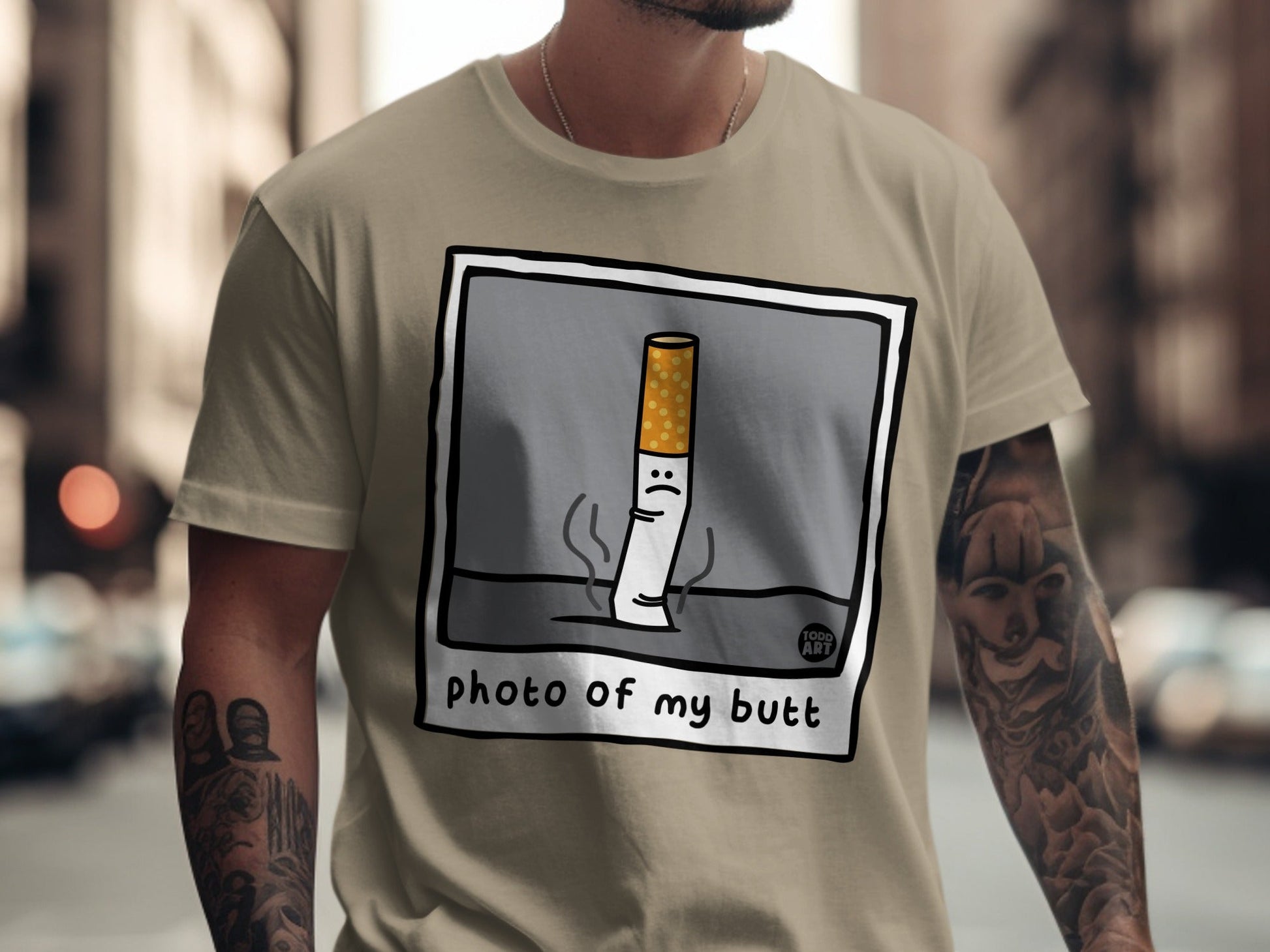 T-shirt with cartoon cigarette illustration and text "photo of my butt".