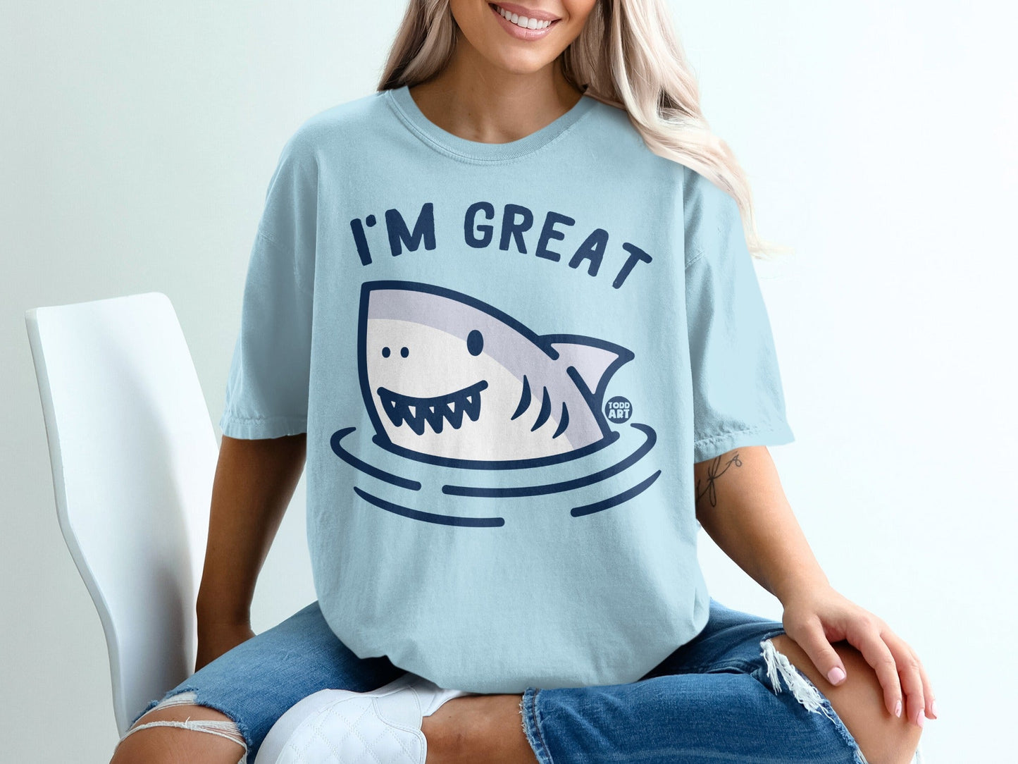 Light blue t-shirt with cartoon shark and "I'm Great" text.
