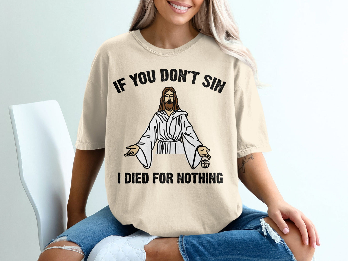 T-shirt with text "IF YOU DON'T SIN I DIED FOR NOTHING" and Jesus graphic.