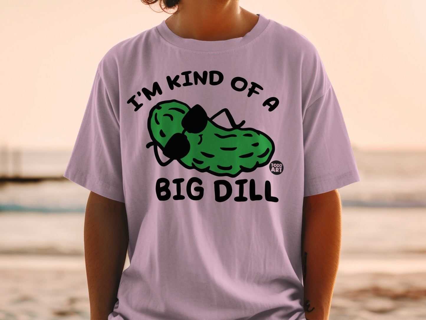 T-shirt with a cartoon pickle wearing sunglasses and text "I'm kind of a big dill".
