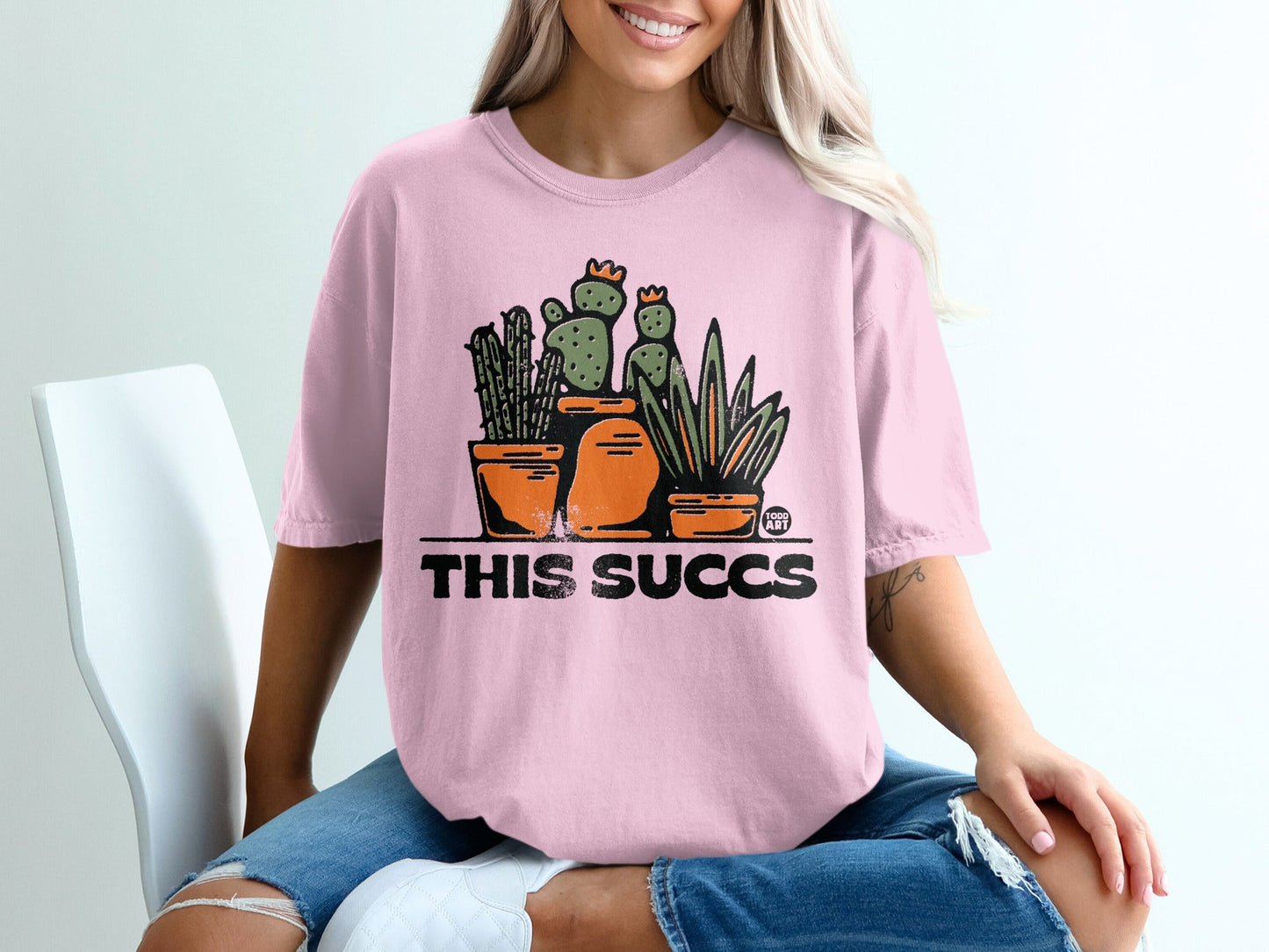 This Su—Å—Åulent Graphic Tee with Cactus Design