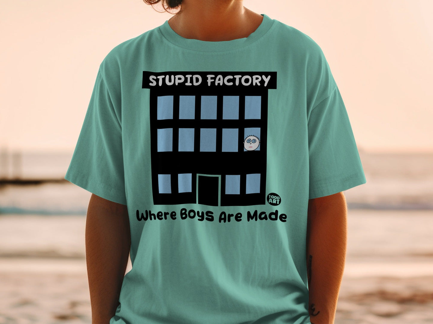 STUPID FACTORY Where Boys Are Made T-shirt Todd Art