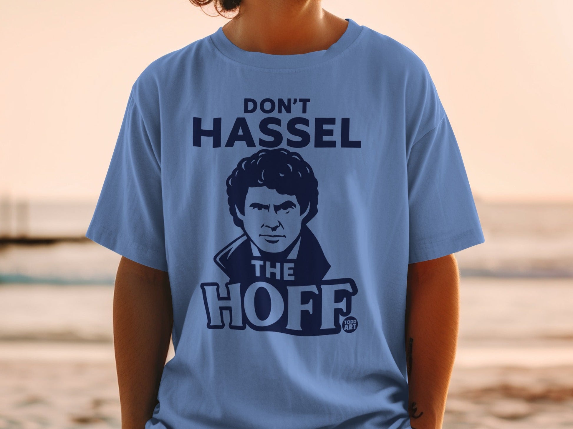 Blue t-shirt with "Don't Hassel the Hoff" text and David Hasselhoff graphic.