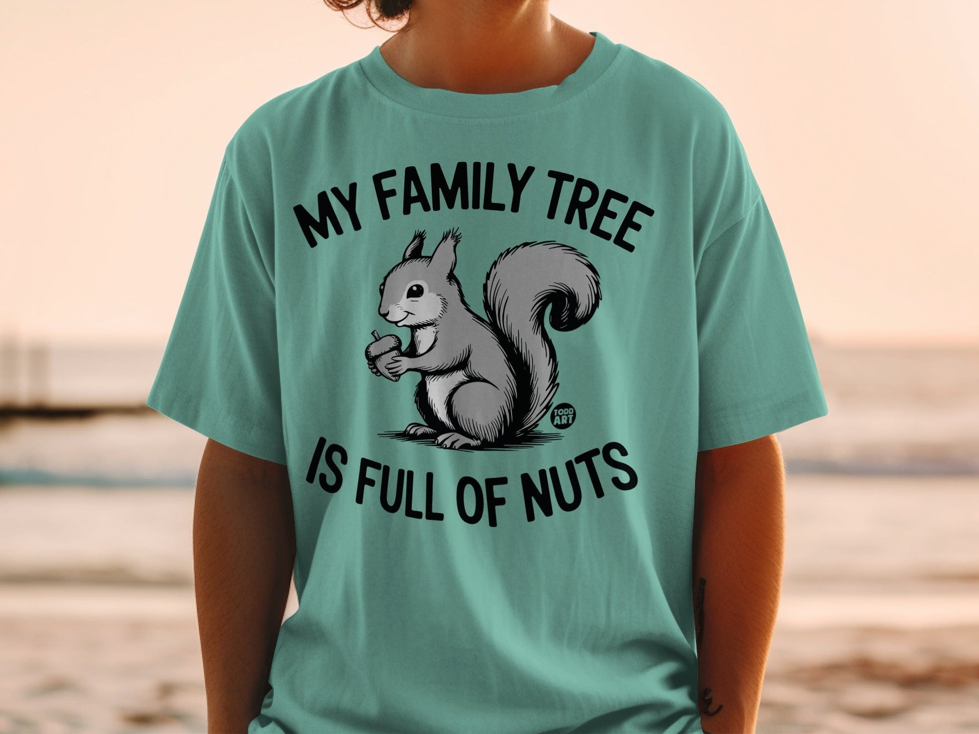 T-shirt with a squirrel holding an acorn and text "My Family Tree is Full of Nuts".