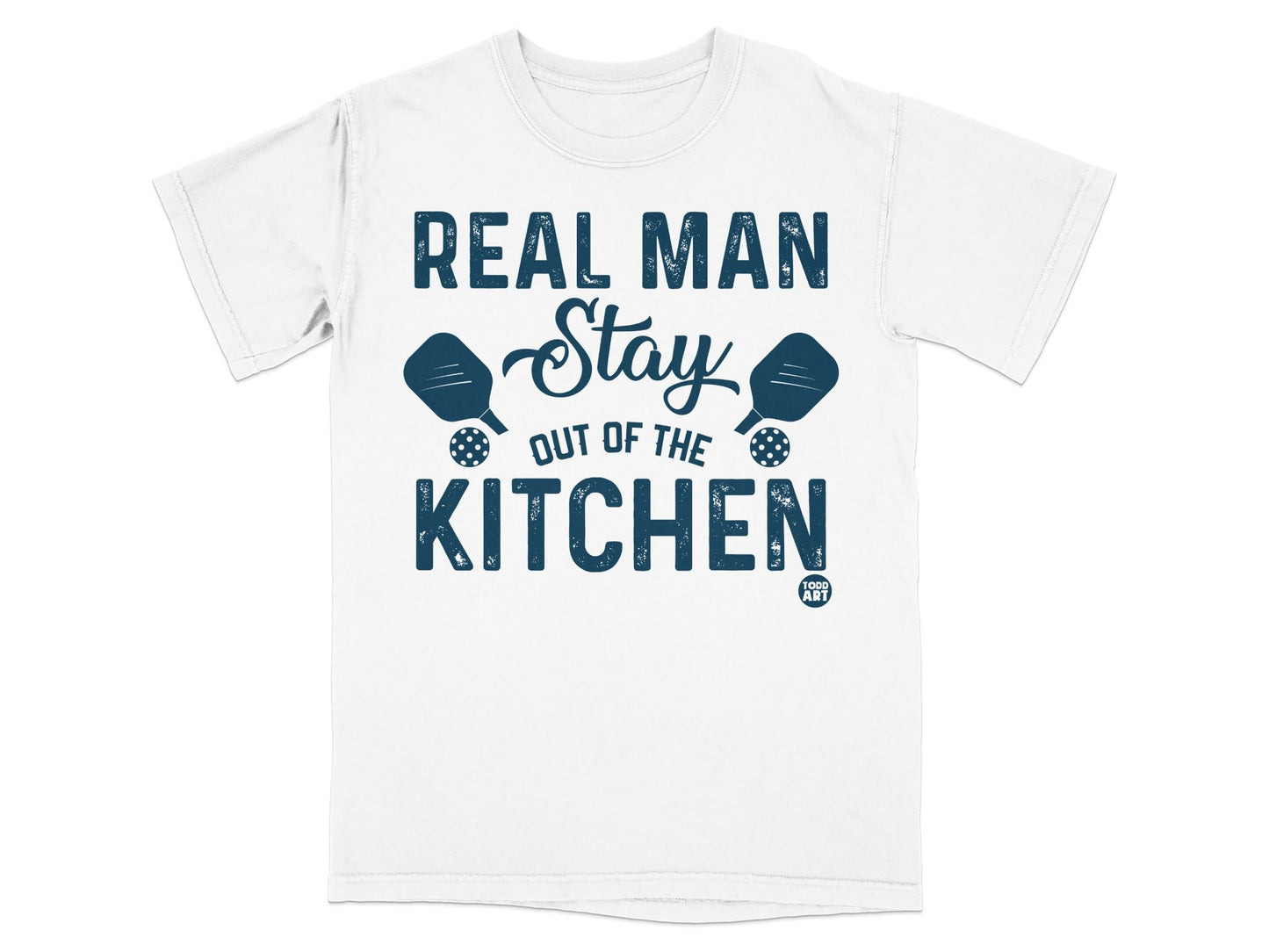 White t-shirt with "Real Man Stay Out of the Kitchen" in blue text.
