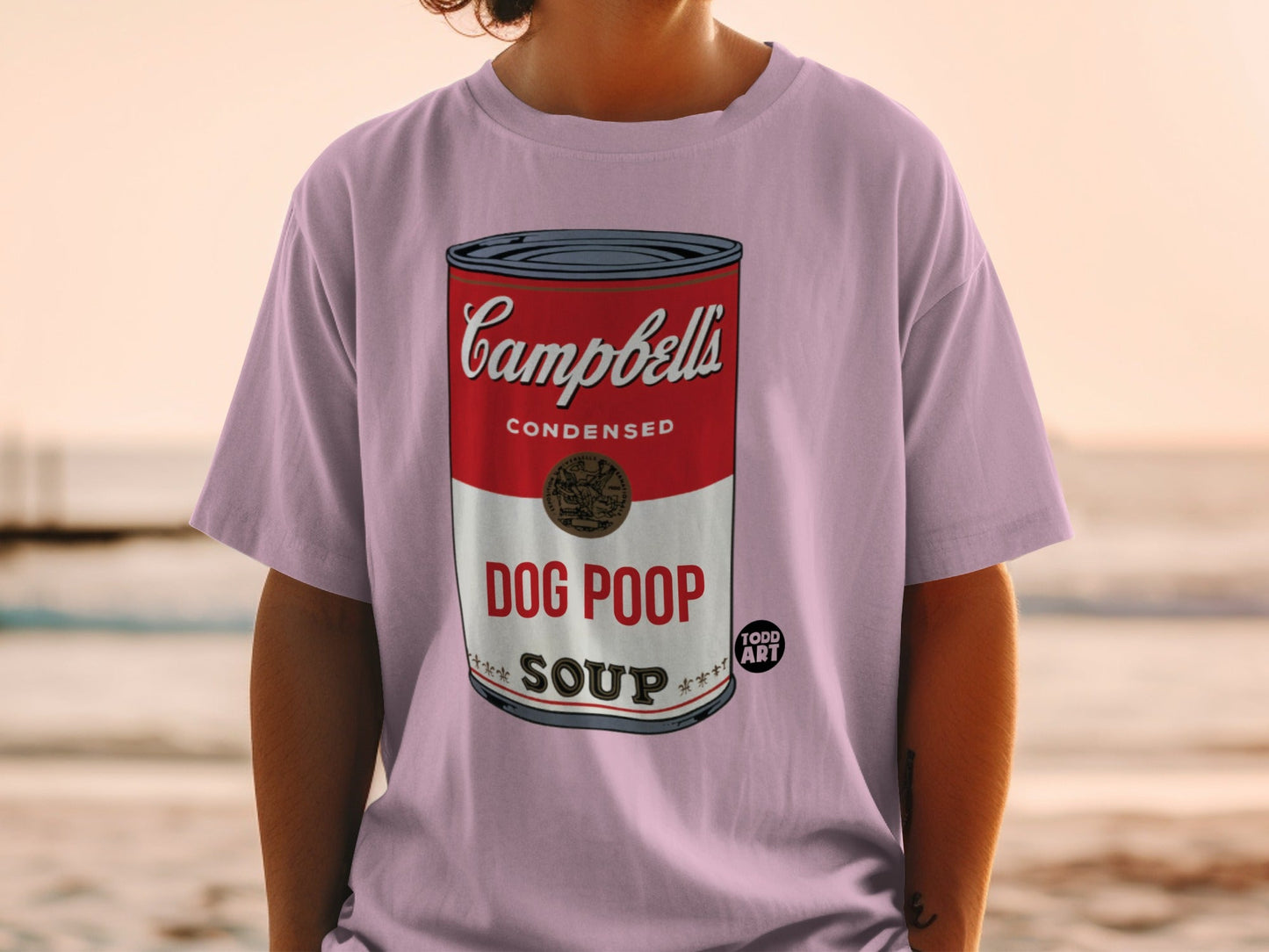 Campbell's Soup can design on a pink t-shirt, reading "Dog Poop Soup".