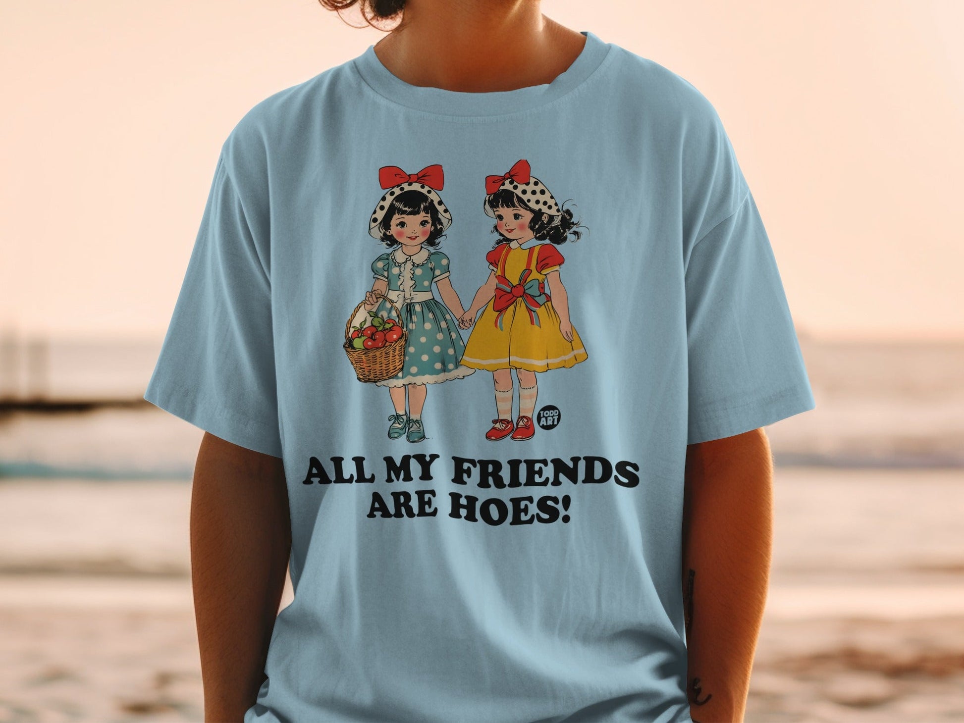 Two vintage-style girls in dresses and bows holding hands.
