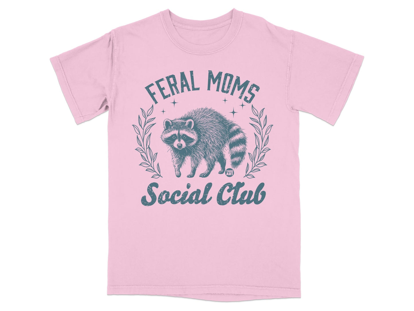 Pink t-shirt with raccoon graphic and "Feral Moms Social Club" text.