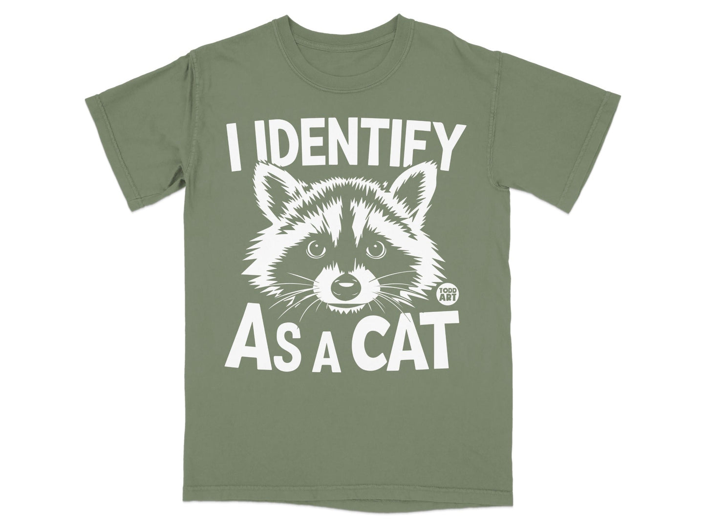 Green t-shirt with raccoon graphic and text "I IDENTIFY AS A CAT".
