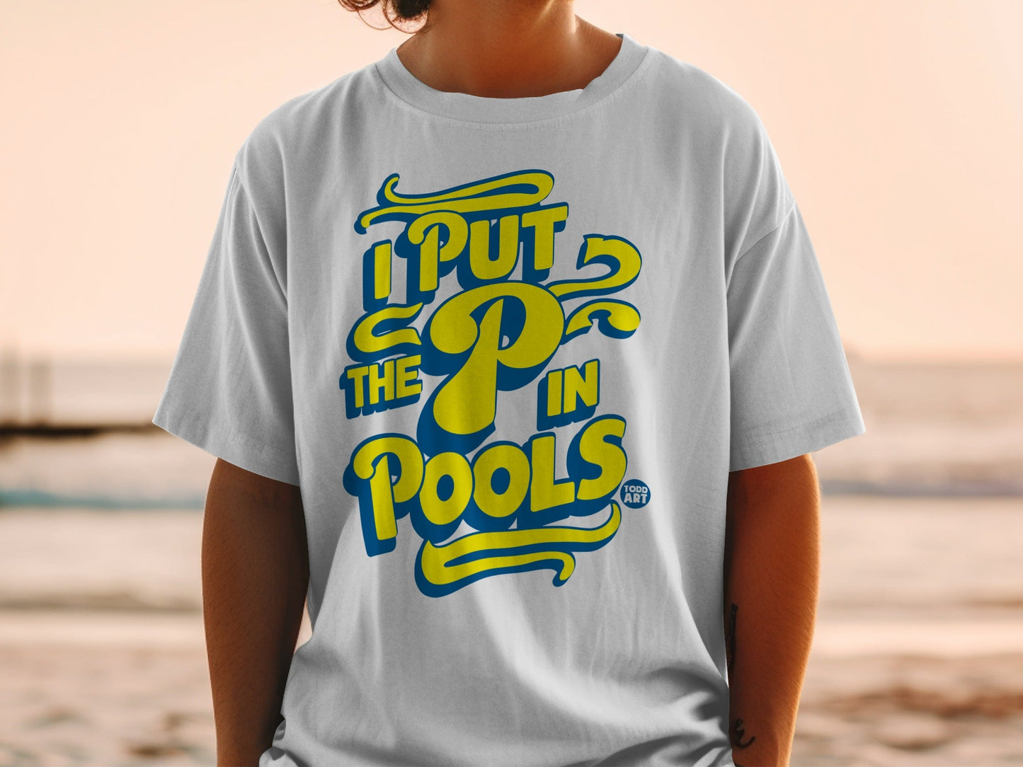 White t-shirt with yellow and blue "The P in Pools" text.