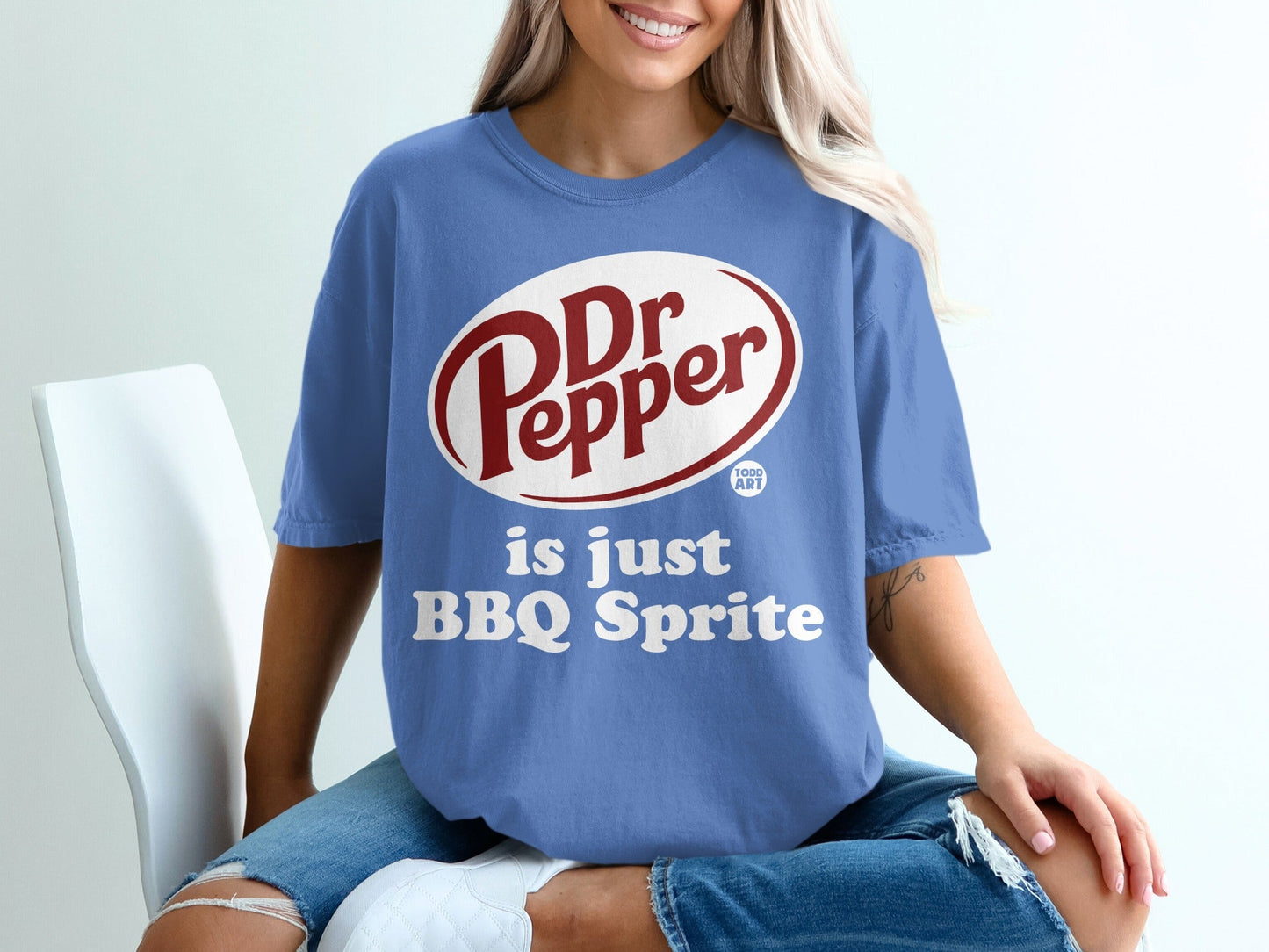 Blue t-shirt with Dr Pepper logo and "is just BBQ Sprite" text.