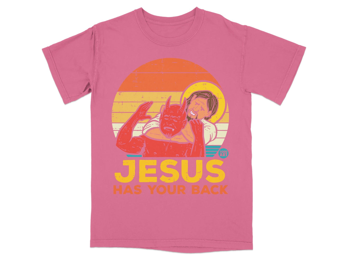 Pink t-shirt with Jesus wrestling a devil, "Jesus Has Your Back" text.