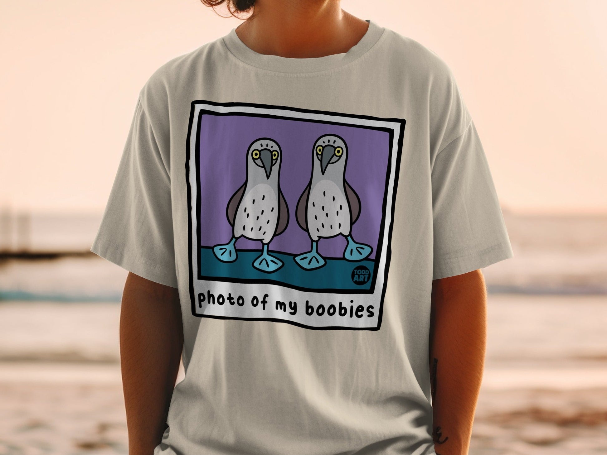 T-shirt with cartoon blue-footed boobies and "photo of my boobies" text.