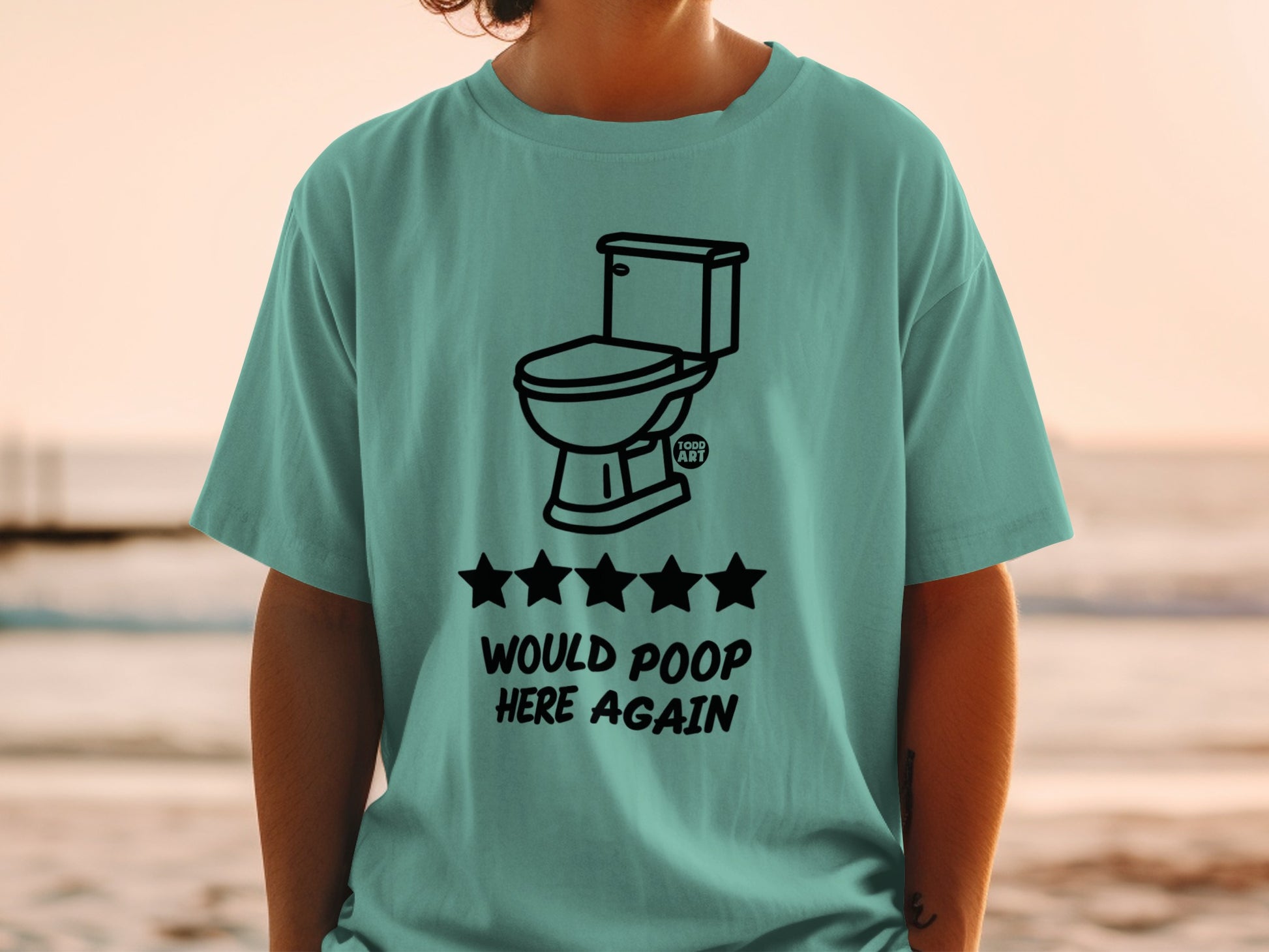 Teal t-shirt with toilet, five stars, and "Would Poop Here Again" text.