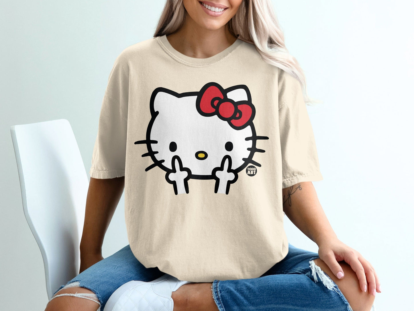 Hello Kitty character wearing a red bow and giving the middle finger.