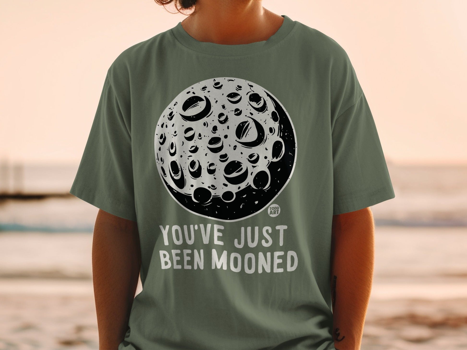 You've Just Been Mooned Graphic T-Shirt by Todd Art