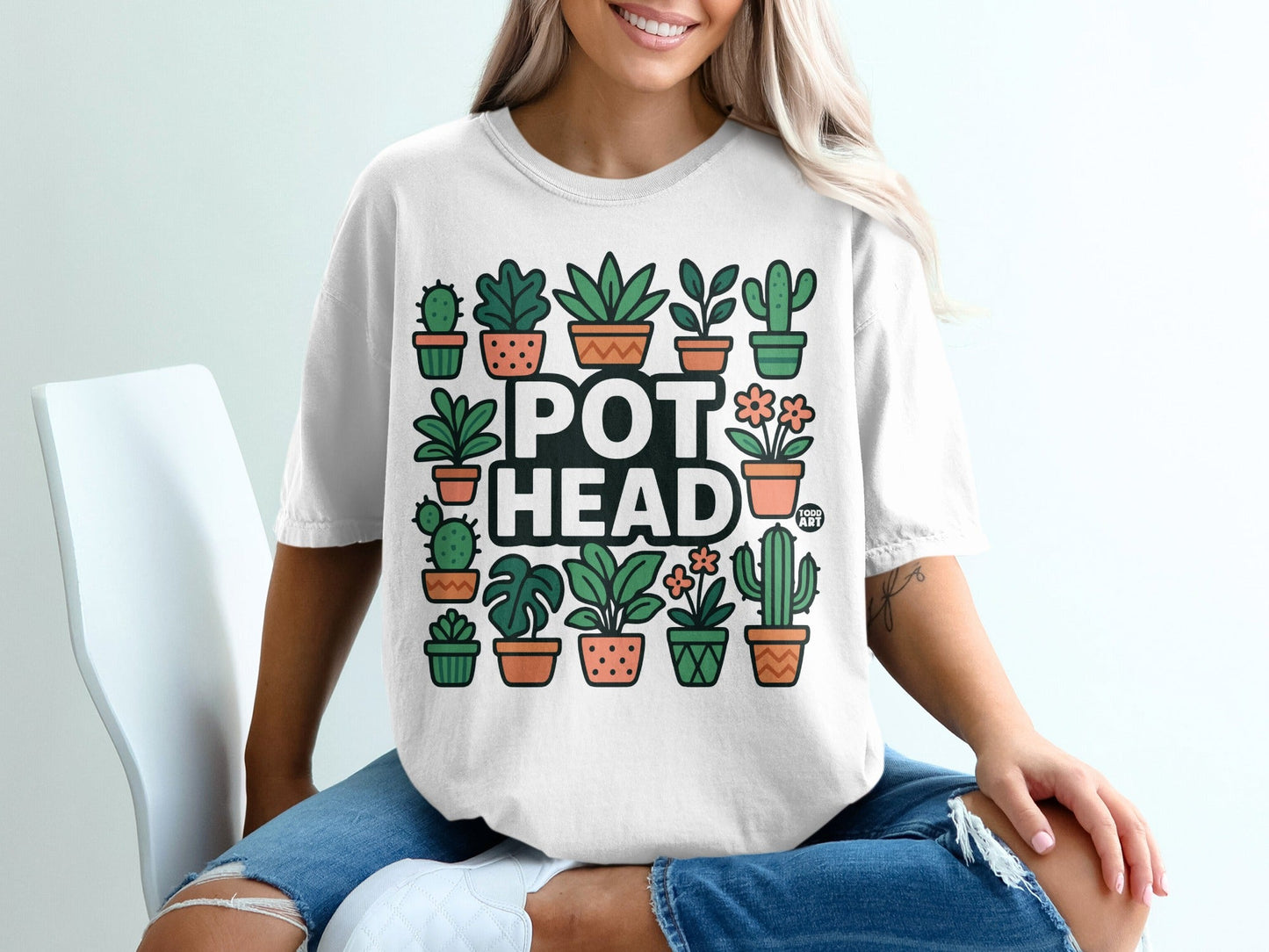 White t-shirt with "POT HEAD" and potted plants graphic.
