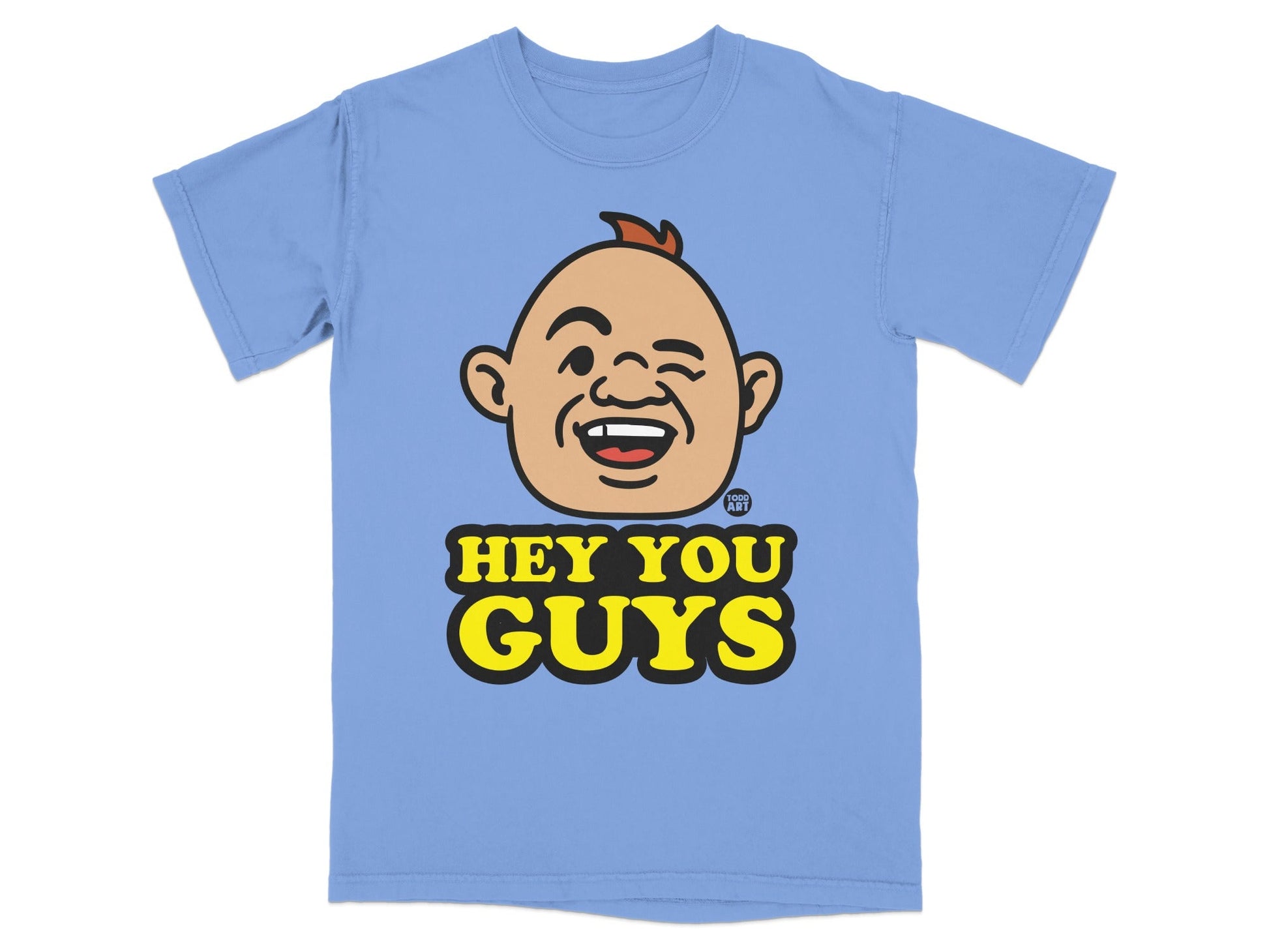 Light blue t-shirt with cartoon character winking and "HEY YOU GUYS" text.