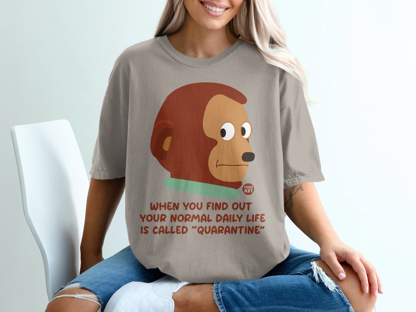 T-shirt with monkey meme and text "When you find out your normal daily life is called 'Quarantine'".
