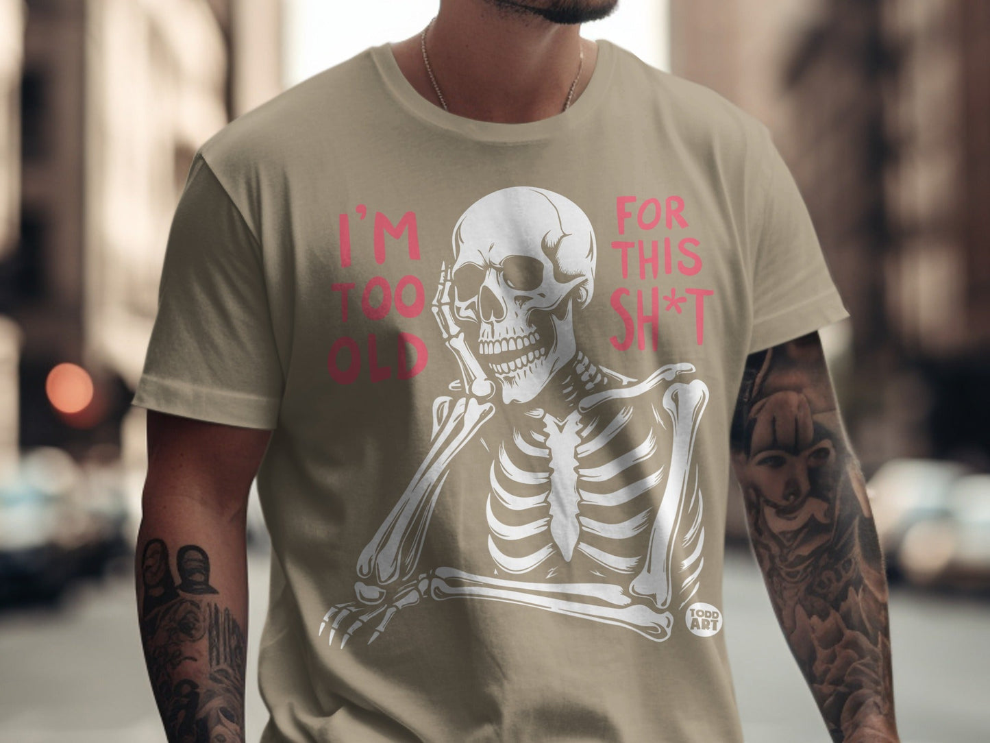 T-shirt with a pink skeleton graphic and text "I'M TOO OLD FOR THIS SH*T".