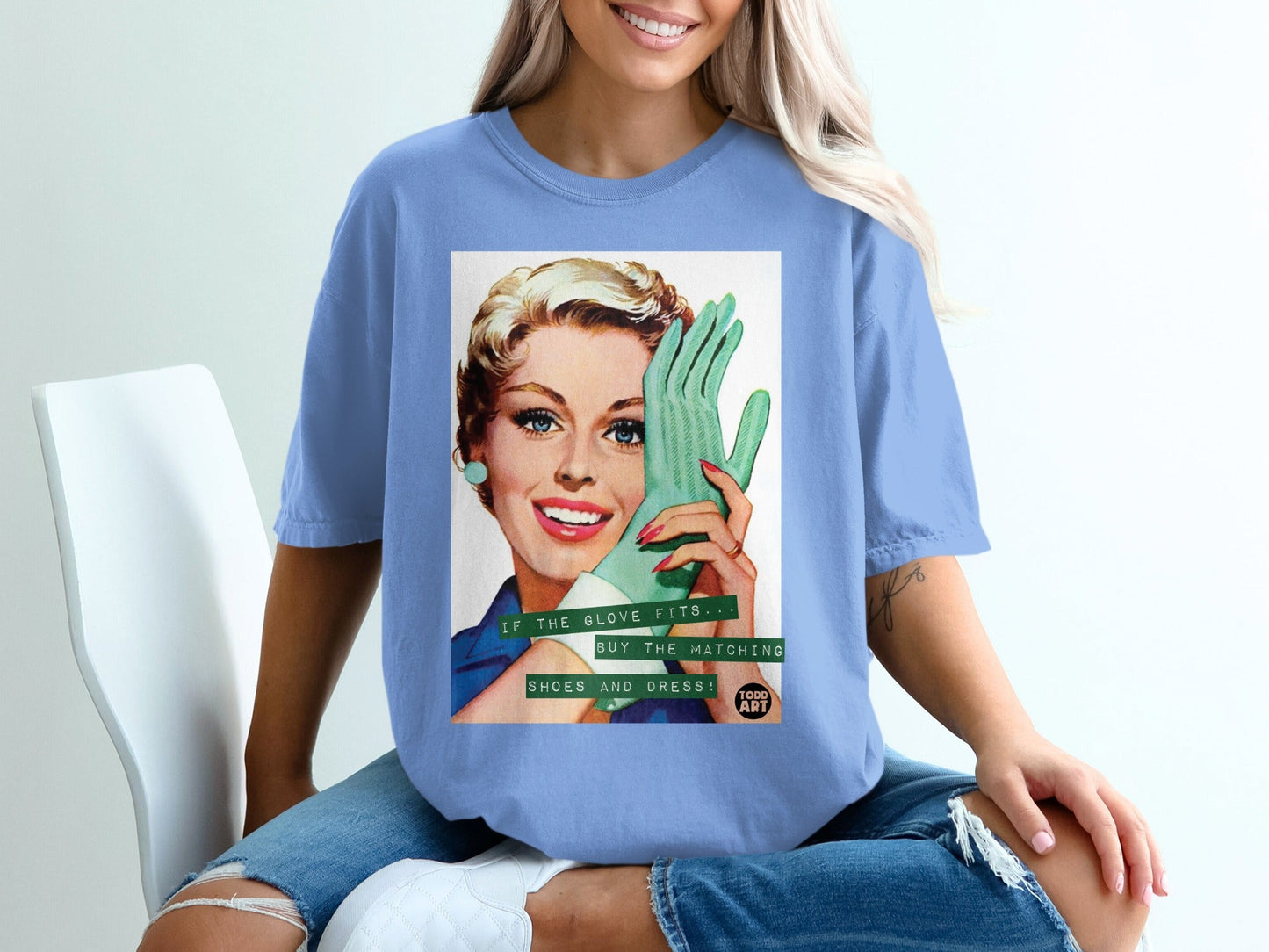 Woman in blue t-shirt holding mint green glove, text reads "Buy the matching shoes and dress".