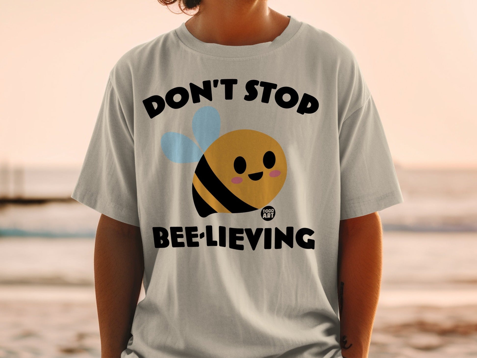 Don't Stop Bee-lieving Todd Art Graphic Tee