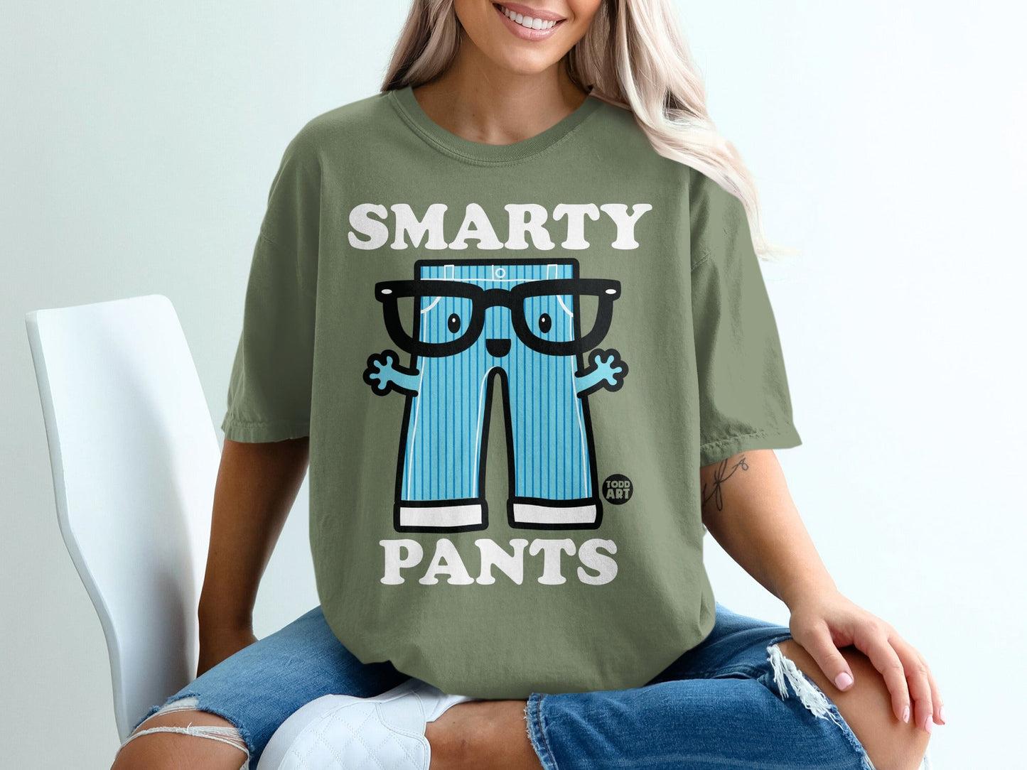 Olive green t-shirt with cartoon pants and "SMARTY PANTS" text.