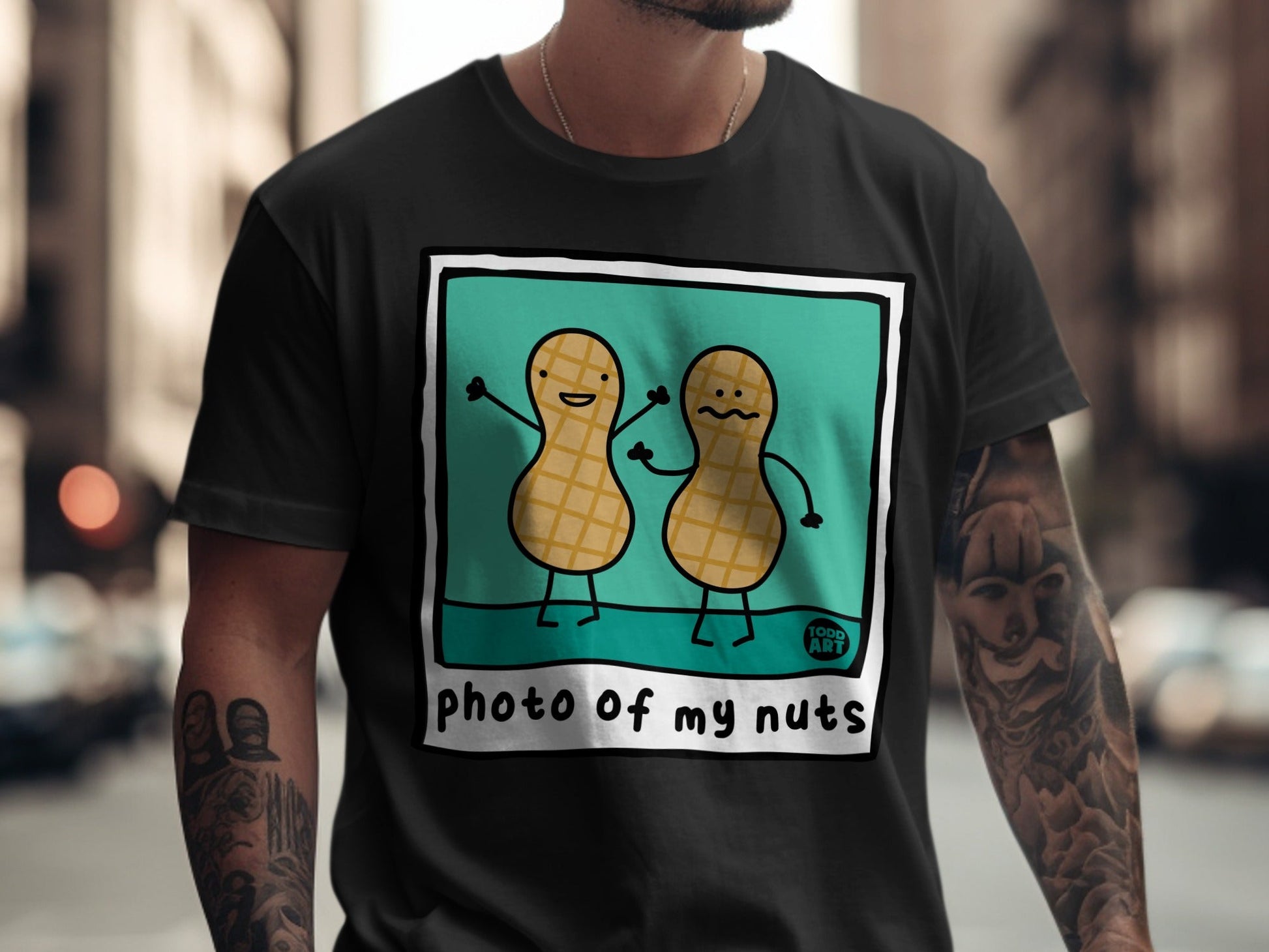 T-shirt featuring cartoon peanuts with happy and sad faces.