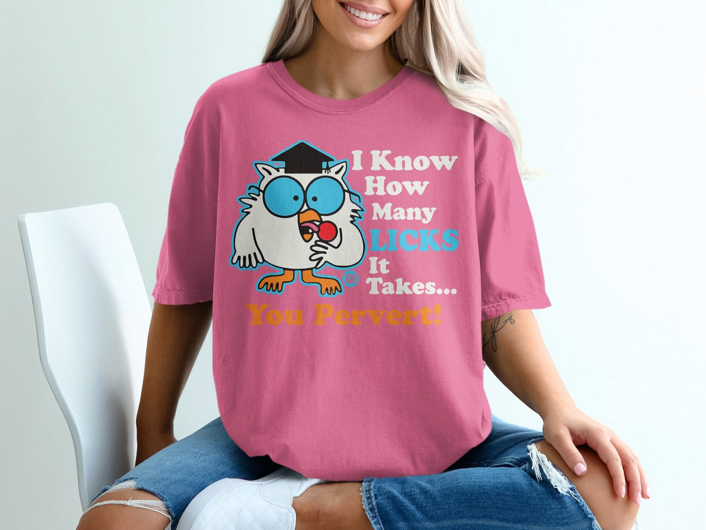 Pink t-shirt with cartoon owl asking "I Know How Many Licks It Takes... You Pervert!"