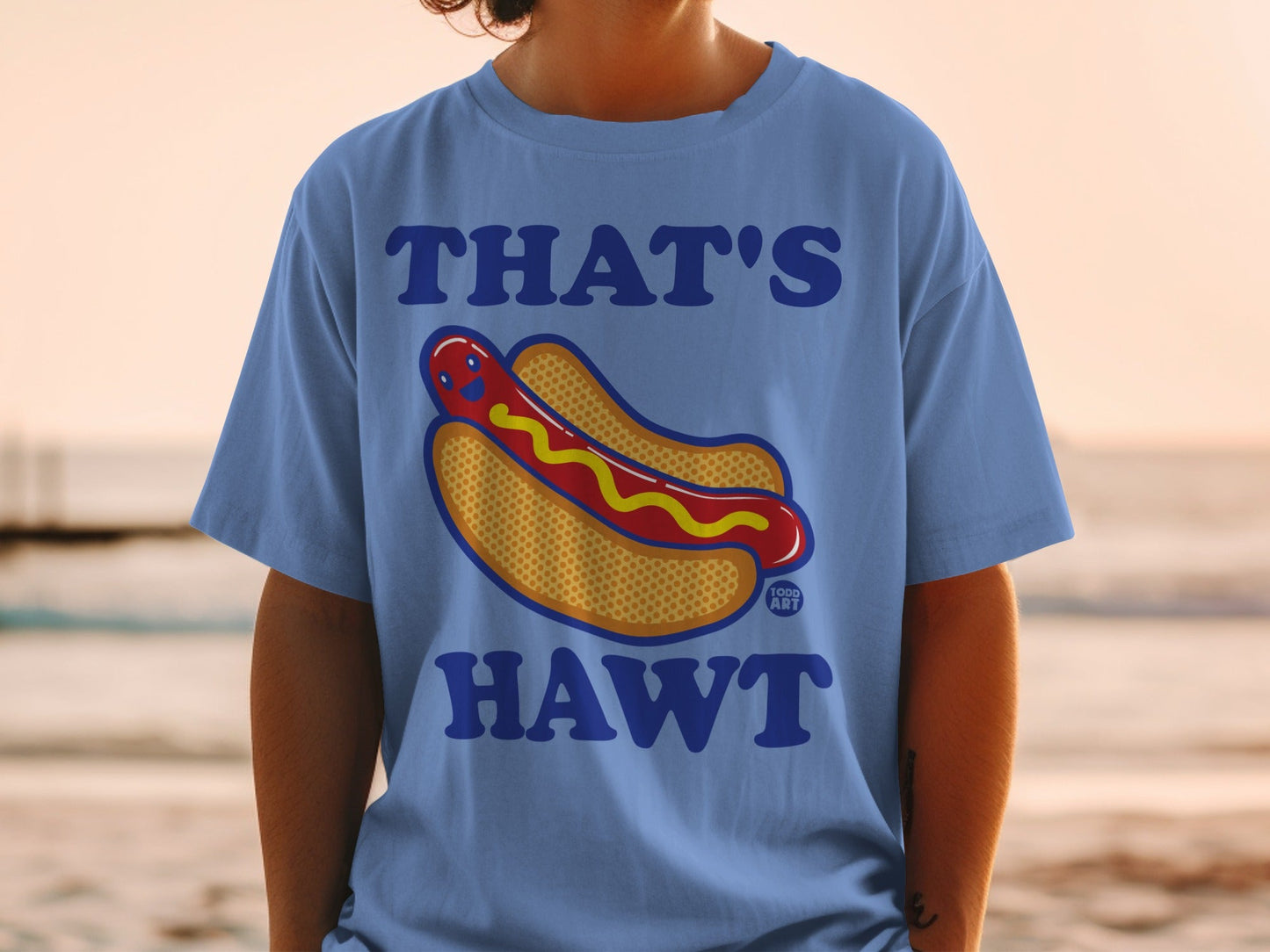 Blue t-shirt with cartoon hot dog and text "THAT'S HAWT".