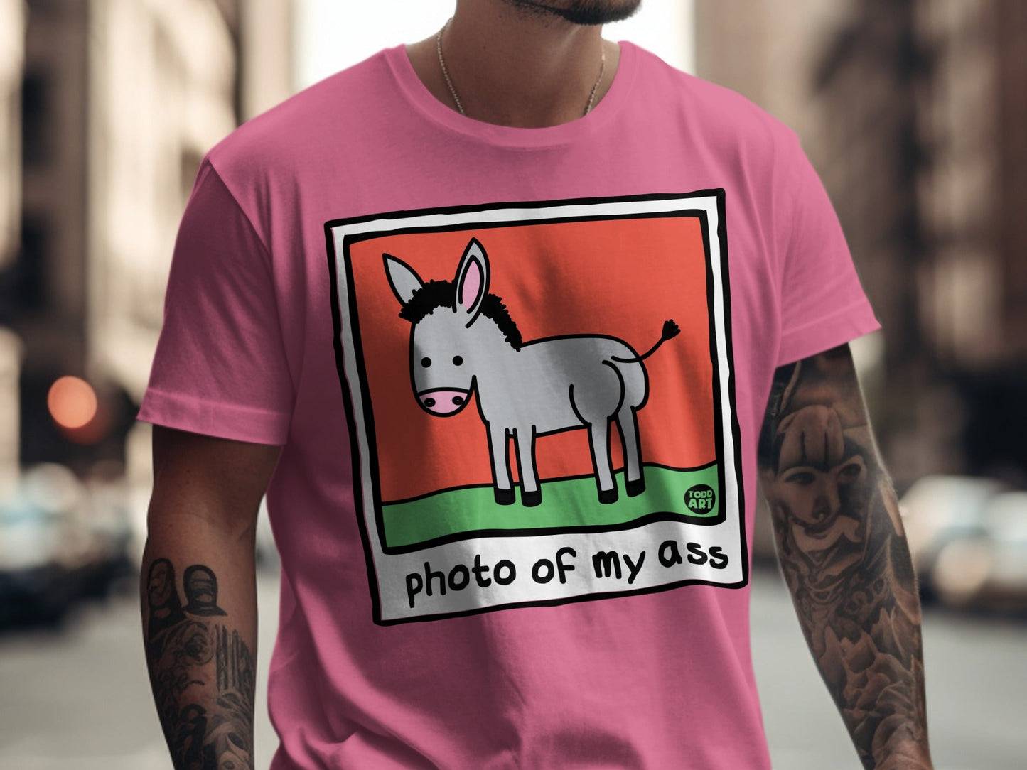 Pink t-shirt with cartoon donkey illustration and text "photo of my ass".