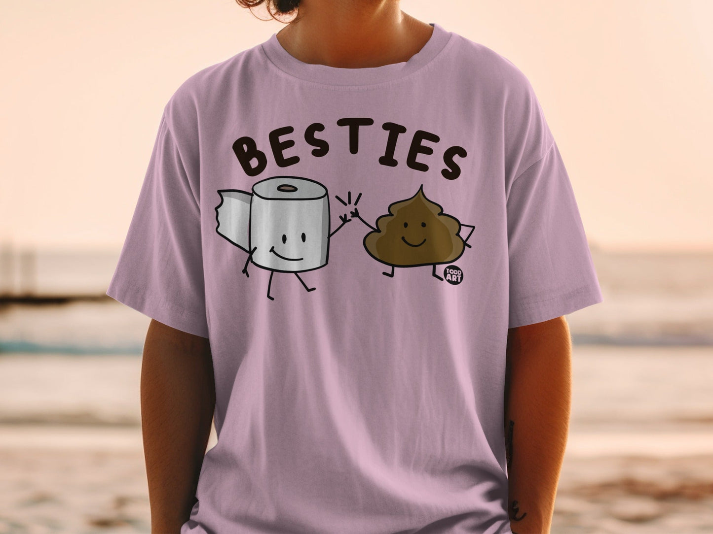T-shirt with cartoon toilet paper and smiling poop characters, "BESTIES" text.