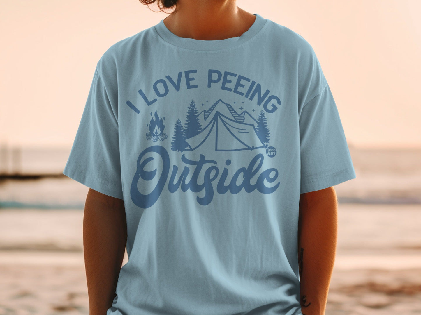 Light blue t-shirt with "I LOVE PEERING OUTSIDE" text and camping graphics.