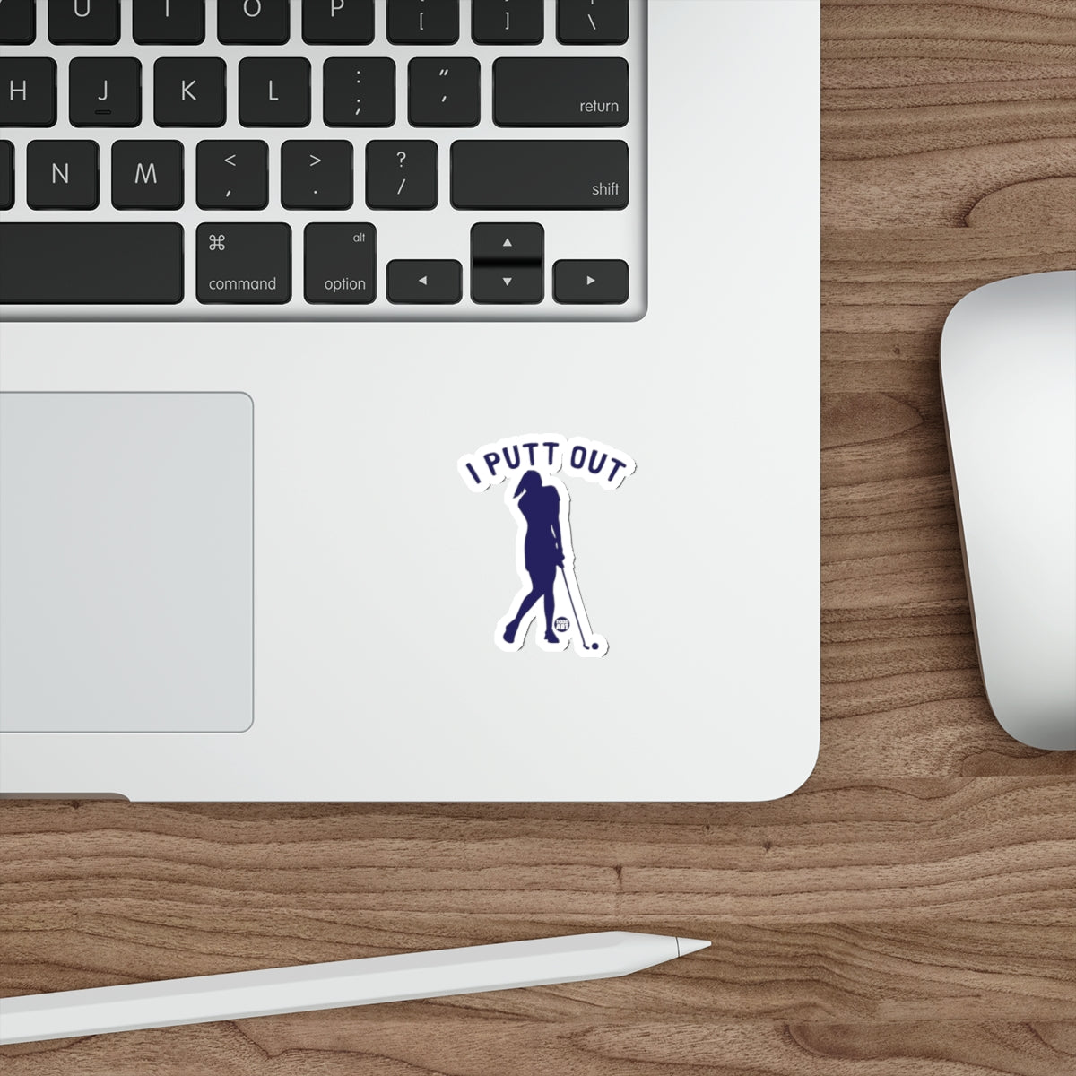"I PUTT OUT" sticker with a female golfer silhouette on a laptop.
