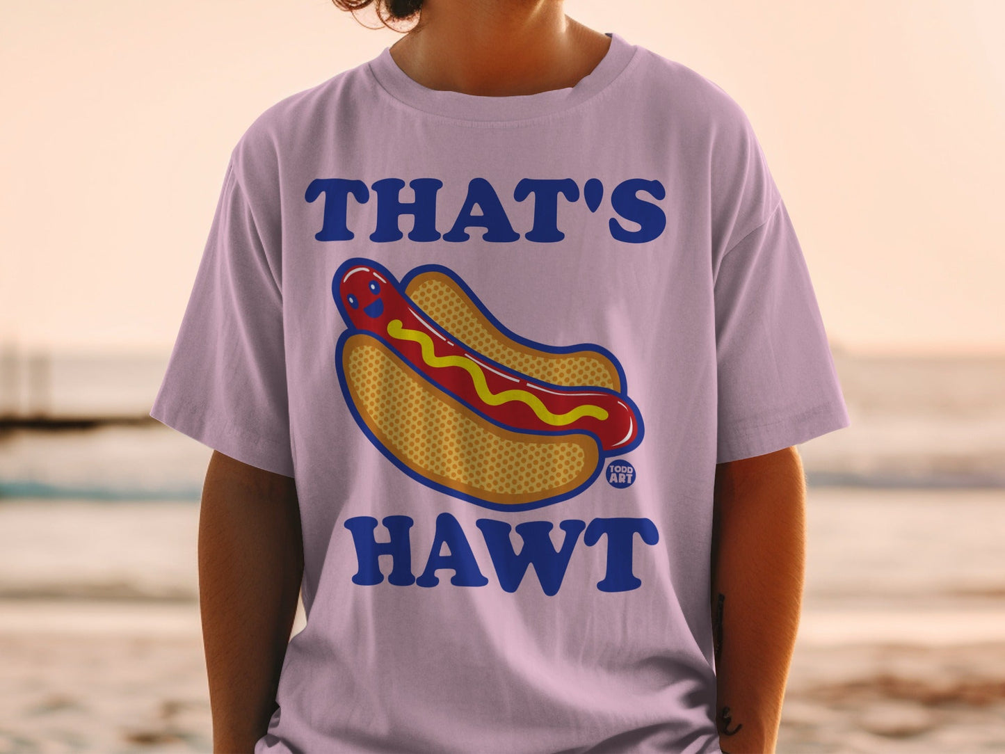 T-shirt with "THAT'S HAWT" text and a cartoon hot dog with a smiley face.