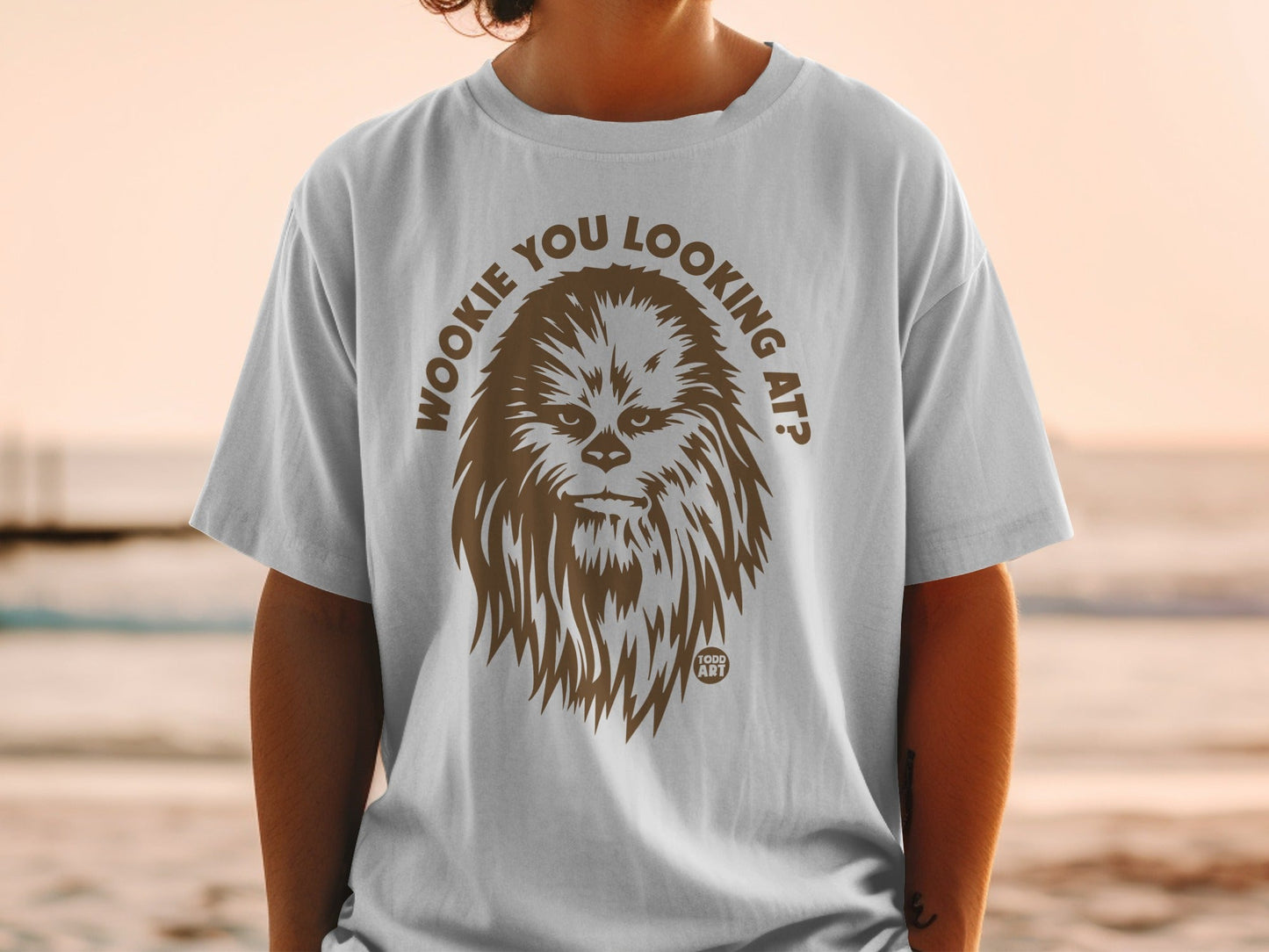 Chewbacca graphic on a white t-shirt with text "Wookie you looking at?".